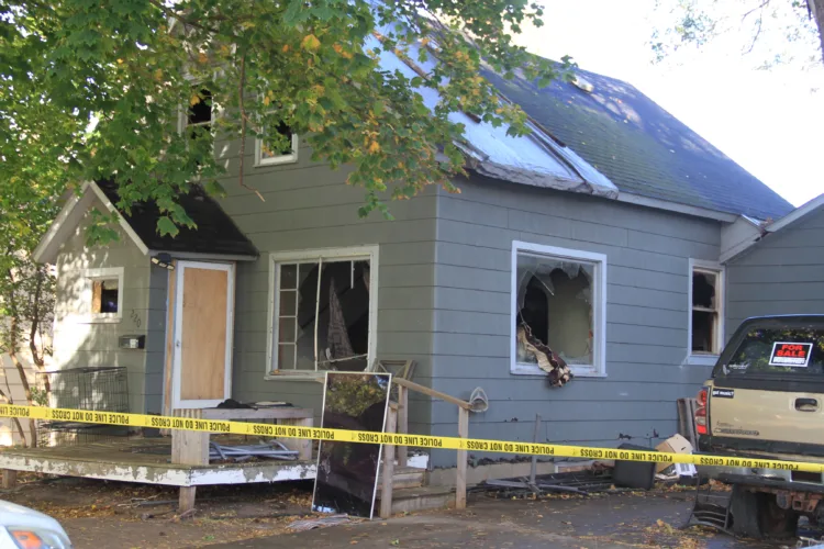 Escanaba home damaged by fire